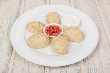 Manty's national Kazakh dish, dough with meat and pumpkin, steamed