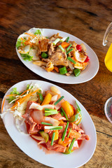 Fried pork served with spicy sweet vegetables.