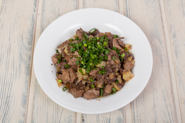 Kazakh national dish of meat and liver - kuyrdak
