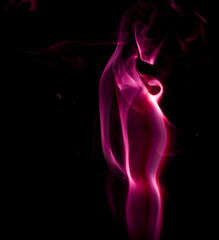 Obraz premium Purple smoke on black background