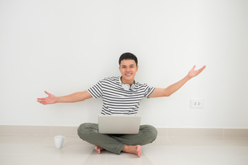 Successful man online with arms up - isolated over white background