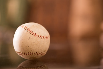 baseball on a glass surface 