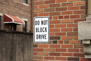 Do not block sign on brick wall