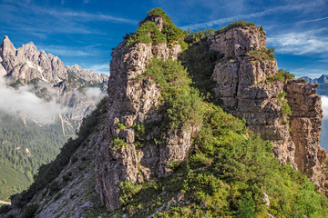 Panoramic view of towers and peaks of the Friuli Dolomites, in the morning light, in Friuli, Italy.