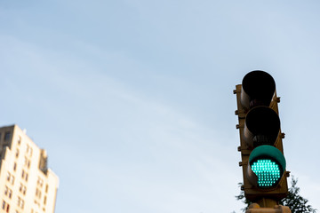 Green traffic light in the city