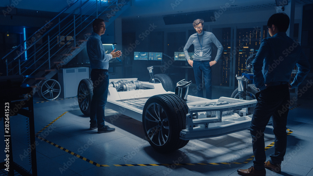 Poster diverse team of automobile design engineers working automotive innovation facility on electric car p