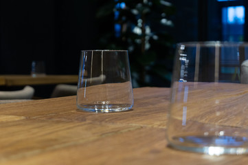transparent glass of water on a wooden table