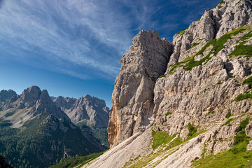 Fototapeta na wymiar Panoramic view of towers and peaks of the Friuli Dolomites, in the morning light, in Friuli, Italy.