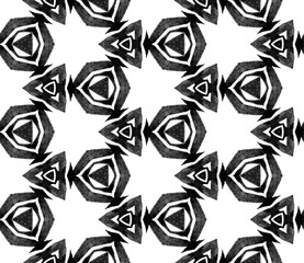Black and white triangular seamless pattern. Hand 