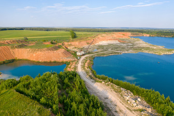 Fototapeta premium On the site of an abandoned quarry formed a lake. 