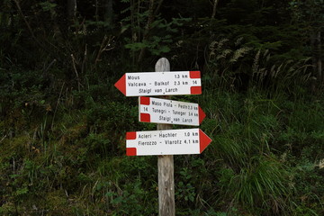 Signs with directions for high mountain trails in Trentino Alto Adige, Italy