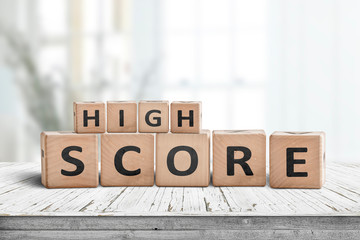 High score sign on a table in a bright home