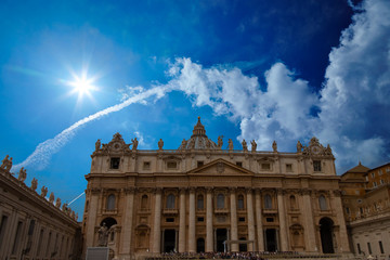 St. Peter's Basilica during the day with a beautiful blue sky in the Vatican