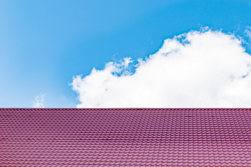 Fragment of a metal roof of a new private house