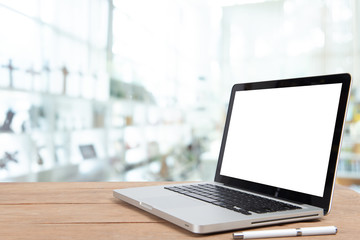 Fototapeta premium Desk Laptop with blank screen on table