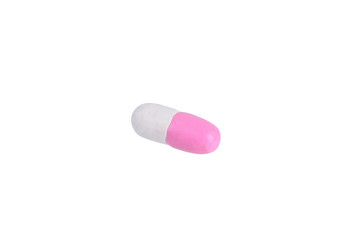 miniature pink drug model from japanese clay on white background