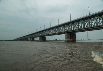 A view from below the bridge across the Amur river