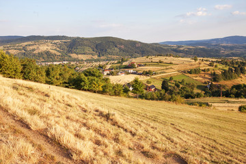 Fototapeta na wymiar Nature and environment. Fields and hills. Mountain landscape in the summer. Travel, tourism and agriculture. Slovakia