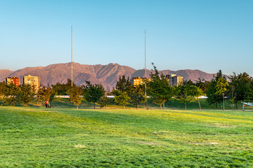 Santiago, Region Metropolitana, Chile - November 19, 2018: View of the Andes Mountain Range from Parque O’Higgins at downtown.