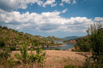 Fototapeta na wymiar Nuoro, Sardinia. Lake of the Mulargia. It is an artificial lake created between 1951 and 1958 following the construction of a dam along the river Mulargia