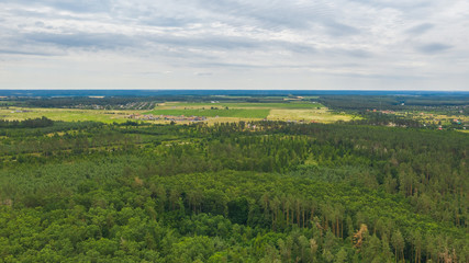 Beautiful aerial view of Ukrainian green landscape. Natural background on a sunny day. Photo of the countryside.
