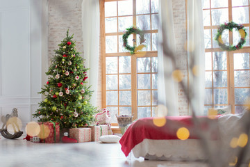 bedroom with Christmas tree and decorations