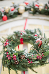 Fototapeta na wymiar Christmas wreath with decorations