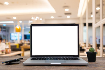 Desk Laptop with blank screen on table