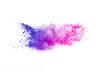 Freeze motion of colorful color powder exploding on white background.  Paint Holi.