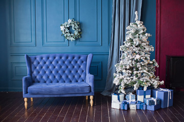blue sofa and Christmas tree
