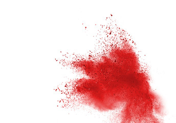 Red powder explosion on white background. Colored cloud. Colorful dust explode. Paint Holi.