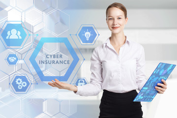 The concept of business, technology, the Internet and the network. A young entrepreneur working on a virtual screen of the future and sees the inscription: Cyber insurance