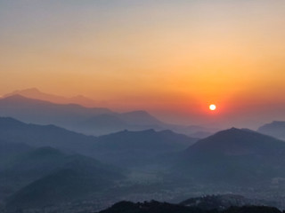 Sun rising over the hills in Pokhara, Nepal
