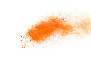 Fototapeta na wymiar Abstract orange powder explosion. Closeup of orange dust particle splash isolated on white background