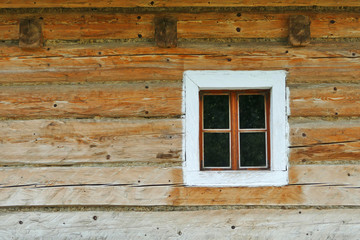 Detail of historic wooden window of old farming house