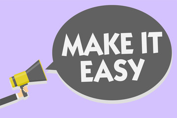 Conceptual hand writing showing Make It Easy. Business photo showcasing Smart approach Effortless Free from worries or difficulties Man holding megaphone speech bubble message speaking loud