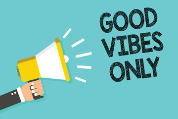 Writing note showing Good Vibes Only. Business photo showcasing Just positive emotions feelings No negative energies Man holding megaphone loudspeaker blue background message speaking