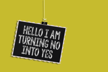 Handwriting text Hello I Am Turning No Into Yes. Concept meaning Persuasive Changing negative into positive Hanging blackboard message communication information sign yellow background