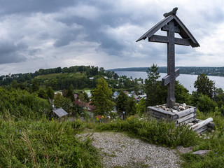 Fototapeta na wymiar The worship cross on Mount Levitan, which is a monument to all Orthodox Christians buried here for many centuries.