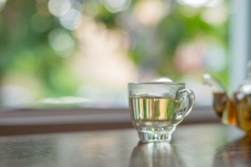 hot tea on wood table, a cup of tea