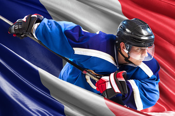 Fototapeta premium France Hockey Player in action around national flags