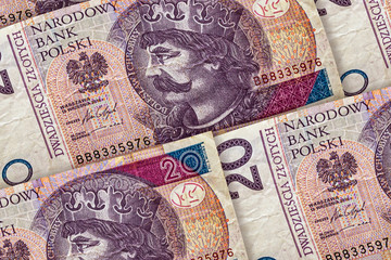 Naklejka premium Closeup Polish zloty banknotes background. PLNpattern.