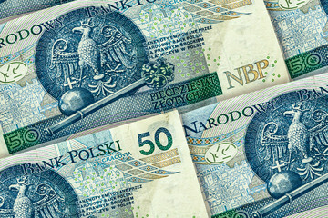 Closeup Polish zloty banknotes background. PLNpattern. 50 zloty