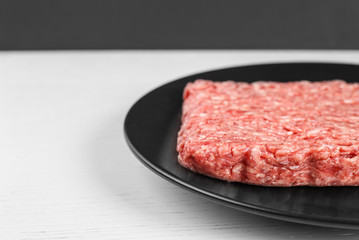 minced beef on white wood background. Close up