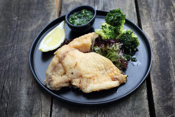Grilled fish with broccoli. Dinner dish. Healthy diet