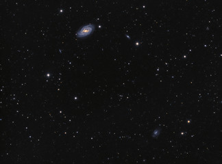Galaxy M109 (Messier 109) and over 40 small galaxies in the constellation Ursa Major. Amateur...