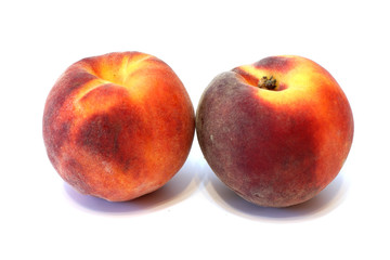 Juicy fresh peaches on white background close up isolated