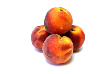 Juicy fresh peaches on white background close up isolated