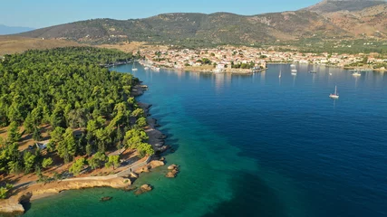 Foto op Canvas Aerial drone photo from picturesque seaside fishing village and port of historic Galaxidi, Fokida, Greece © aerial-drone