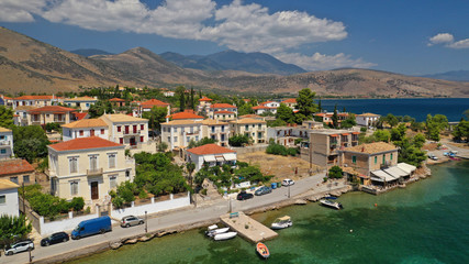 Fototapeta na wymiar Aerial drone photo from picturesque seaside fishing village and port of historic Galaxidi, Fokida, Greece